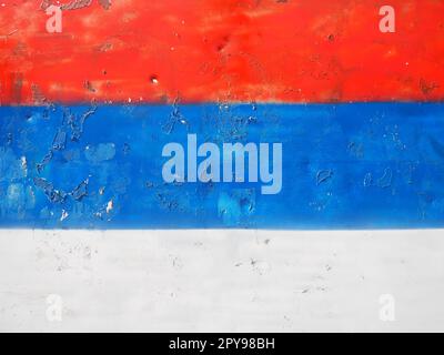 Serbian flag, tricolor red, blue, white painted on a metal surface. Peeling paint Stock Photo