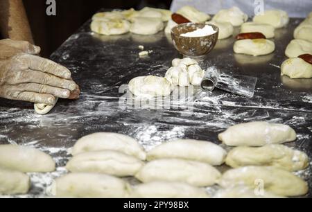 Kneading bread dough Stock Photo