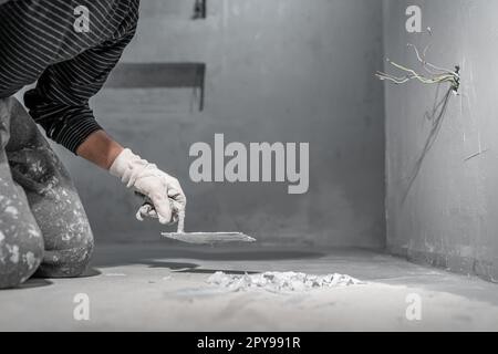 masonry work with a trowel on the construction site Stock Photo