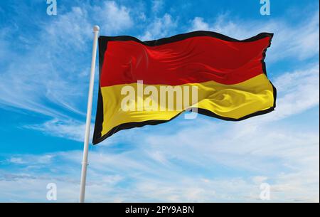 flag of Dravidian peoples Tamils at cloudy sky background, panoramic ...