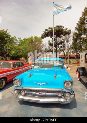 Lanus, Argentina - Sept 25, 2022: Old sky blue 1957 Chevrolet Chevy Bel Air sport sedan two door in the a park. Iconic classic car. Stock Photo