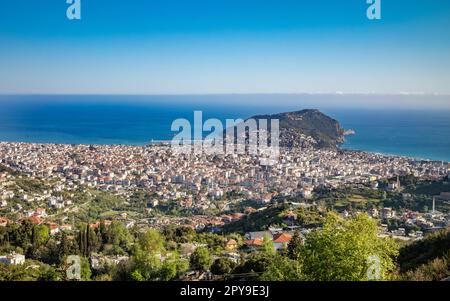 A breathtaking panoramic view of Alanya, Turkey, from the foothills of the majestic Taurus Mountains Toros Mountains), capturing the heart of the city Stock Photo