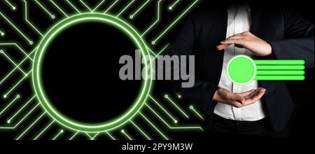 Lady in black office suit standing and holding important technological message between her hands. Futuristic style image with color glow presenting news. Stock Photo