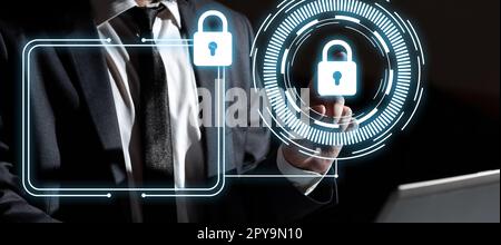 Businessman in office suit sitting at the table ant typing important message with laptop. Futuristic digital design with colored glow presenting technical news. Stock Photo