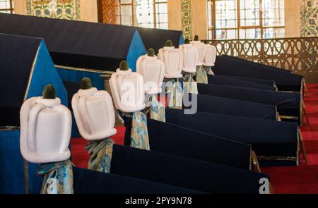 Rows of coffins in an ottoman turkish mausoleum tomb Stock Photo