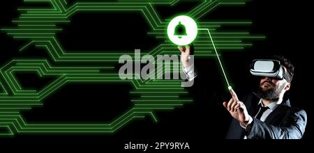 Businessman in black office suit standing wearing VR glasses and looking at technological message. Man pressing virtual buttons with his both fingers. Futuristic style. Stock Photo