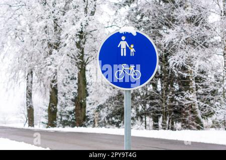 Blue sign for bike and pedestrian path Stock Photo