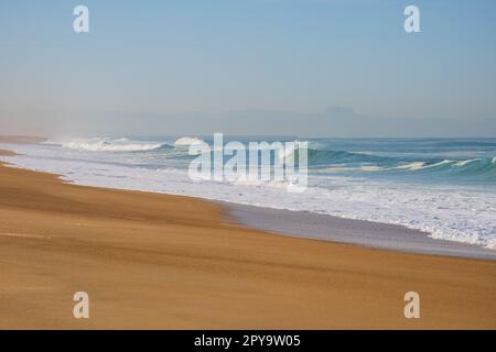 Waves breaking on the shore of Biarritz Stock Photo