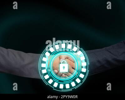 Two men in suits shaking hands in front futuristic style background with colored glow. New digital technologies of future. Handshake represents agreement. Stock Photo