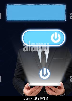 Businessman in black suit standing and holding tablet in two hands. Glow going from device display. Futuristic style image with colored bright glowing. Digital design. Stock Photo