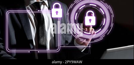 Businessman in office suit sitting at the table ant typing important message with laptop. Futuristic digital design with colored glow presenting technical news. Stock Photo