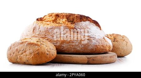 A loaf of bread and rolls isolated on white background Stock Photo