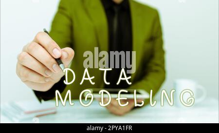 Text caption presenting Data Modeling. Business concept process of transferring data between data storage systems Stock Photo