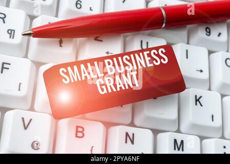 Text showing inspiration Small Business Grant. Business idea an individual-owned business known for its limited size Stock Photo