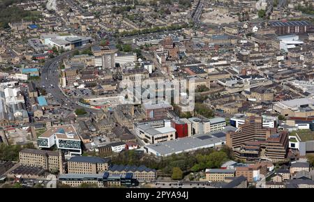 aerial view of Huddersfield town centre from the South and including Huddersfield University in the foreground, West Yorkshire Stock Photo