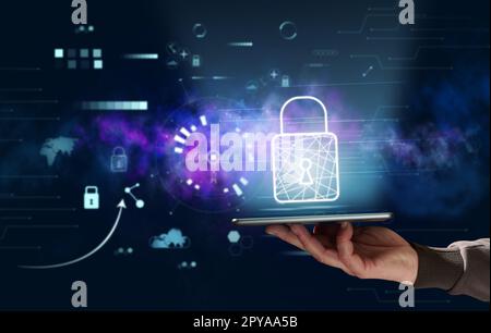 Man's hand holding smartphone, lock icon above it, concept of personal data protection in the world wide web Stock Photo