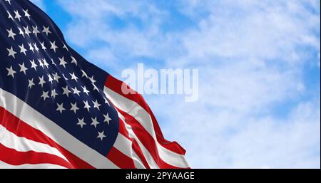 The flag of the United States of America waving on a sunny day Stock Photo