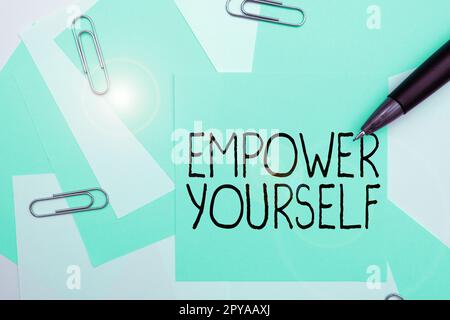 Sign displaying Empower Yourself. Business concept taking control of life setting goals positive choices Stock Photo