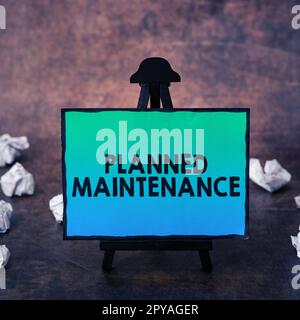 Writing displaying text Planned Maintenance. Concept meaning Check ups to be done Scheduled on a Regular Basis Stock Photo