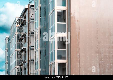 Building under construction with scaffolds Stock Photo