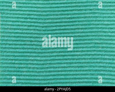 Close-up of a striped fabric with raised printing. Horizontal stripes on green microfiber or sponge Stock Photo