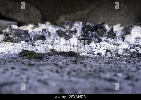 Extinguished coal in the ember Stock Photo