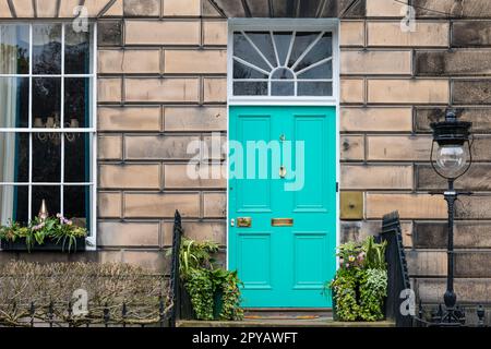 Edinburgh, Scotland, United Kingdom, 3rd May 2023. Miranda Dickson's New Town door: the controversial pink door has been painted 'peacock green' after Edinburgh City Council threatened to fine the owner £20,000, as ti was deemed to be inconsistent with a UNESCO World Heritage Site. Credit: Sally Anderson/Alamy Live News Stock Photo