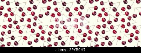Seamless endless pattern of bright ripe red sweet cherries, isolated on white background Stock Photo