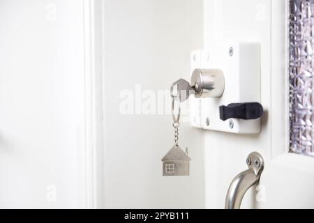 closeup Door lock keys, Real estate concept door handle, Key insert locking and savety with copy space, house,hotel, appartment, new home concept Stock Photo