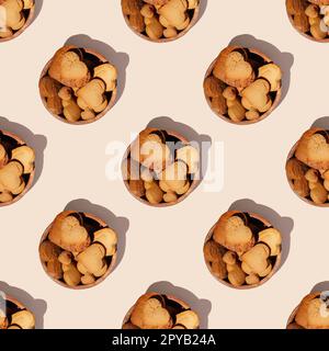 Seamless endless pattern of heart shaped gingerbread cookies in wooden bowl with shadows isolated on pink background Stock Photo