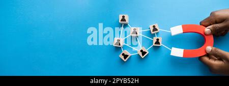 Business Lead And Customer Generation Magnet Pulling Stock Photo
