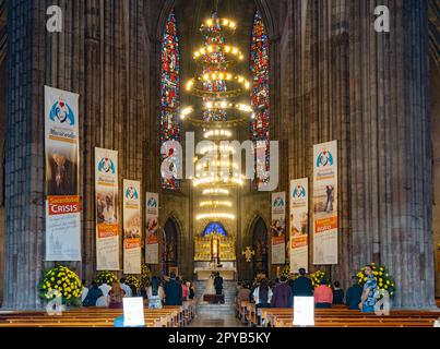 Mexico, APR 22 2023 - Interior view of the Templo Expiatorio del Santisimo Sacramento going on with a wedding ceremony Stock Photo