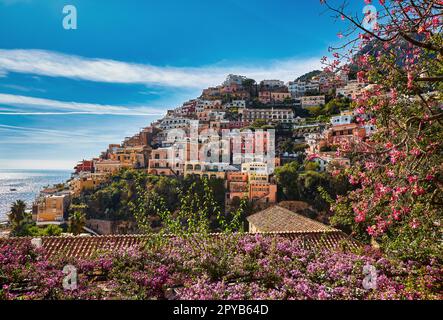 Panoramic view of Positano with comfortable beaches and blue sea on Amalfi Coast in Campania, Italy. Amalfi coast is popular travel and holyday destin Stock Photo