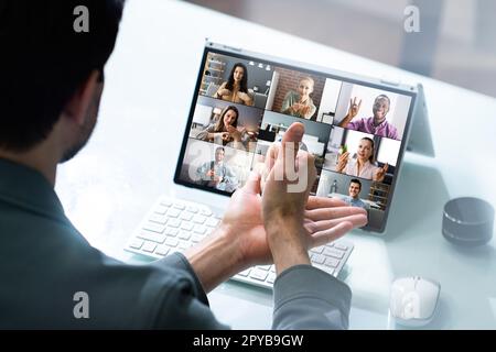 Learning Disabled Deaf Sign Language In Video Conference Stock Photo