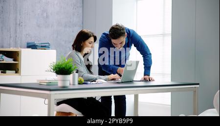 Business People Training On Computer. Stock Photo