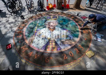 London, UK.  3 May 2023.  Pavement chalk artist Julian Beever works on his artwork near Trafalgar Square dedicated to King Charles.  Rain permitting, he plans to continue until the coronation of King Charles III and Queen Camilla on 6 May.   Credit: Stephen Chung / Alamy Live News Stock Photo