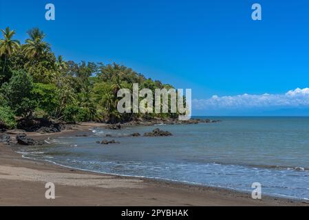 Sandy beach of the small town of Drake Bay, Puntarenas, Costa Rica Stock Photo