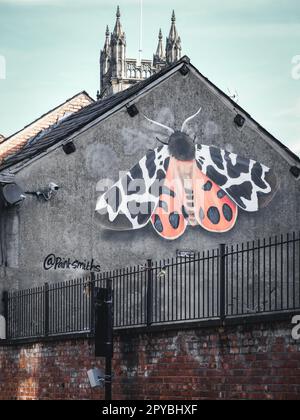 Butterfly artwork by Paintsmiths on the side of a building at the underbanks, Stockport, UK Stock Photo