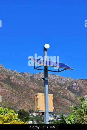 solar-powered surveillance camera in a suburb Stock Photo