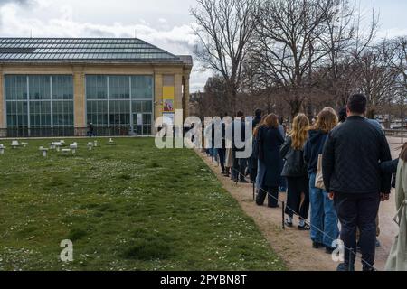 Long line outside Musée de l'Orangerie in Paris, France. March 25, 2023. Stock Photo