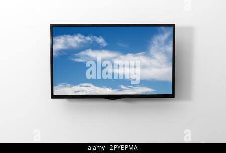 TV monitor with picture on the wall Stock Photo