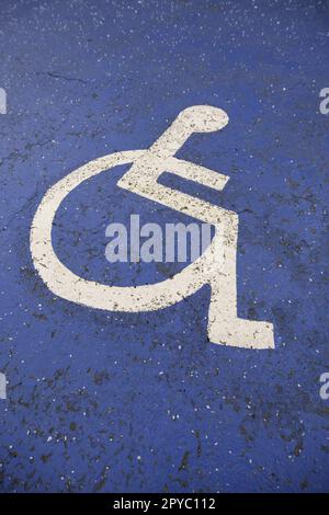 Disabled sign on the asphalt Stock Photo