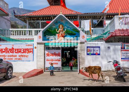 Rishikesh, Uttarakhand, India - 28.03.2023: Hindu temple in holy yoga city Rishikesh, exterior architecture hindu temple near river ganges. Hight qual Stock Photo