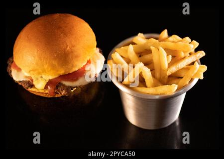 Fresh tasty burger on black Stock Photo