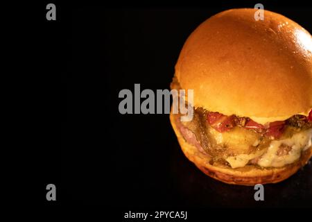 Fresh tasty burger on black Stock Photo