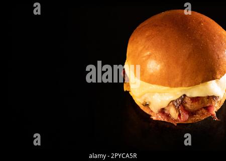 Fresh tasty burger on black Stock Photo