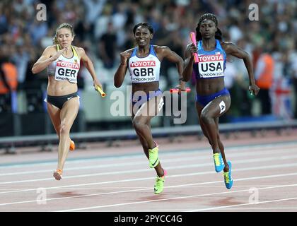 London Stadium, East London, UK. 12th Aug, 2017. IAAF World Championships, Day 9; Tori Bowie of USA racing alongside Daryll Neita of Great Britain and Rebekka Haase of Germany down the home straight in the 4x100 metres relay final Credit: Action Plus Sports/Alamy Live News Stock Photo