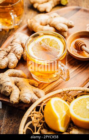 Ginger tea with lemon on a wooden table Stock Photo