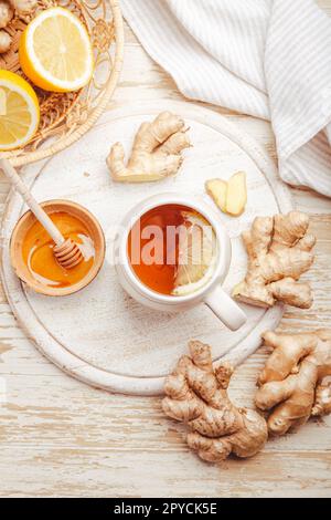 Ginger tea with lemon on a wooden table Stock Photo