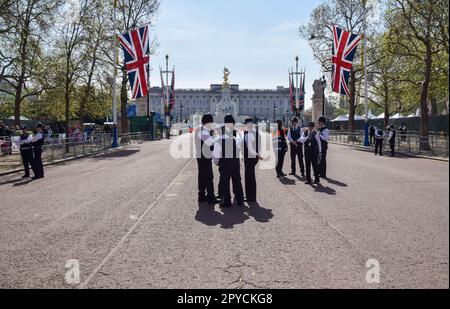 London, England, UK. 3rd May, 2023. A royal superfan sits next to a cardboard cutout of King Charles III and Queen Camilla on The Mall as fans set up camp ahead of the coronation. (Credit Image: © Vuk Valcic/ZUMA Press Wire) EDITORIAL USAGE ONLY! Not for Commercial USAGE! Stock Photo